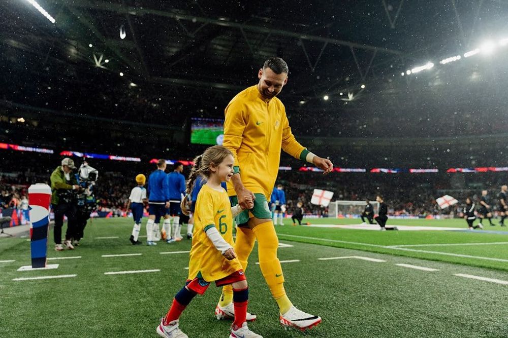 Boyle with Daughter at Wembley.jpg